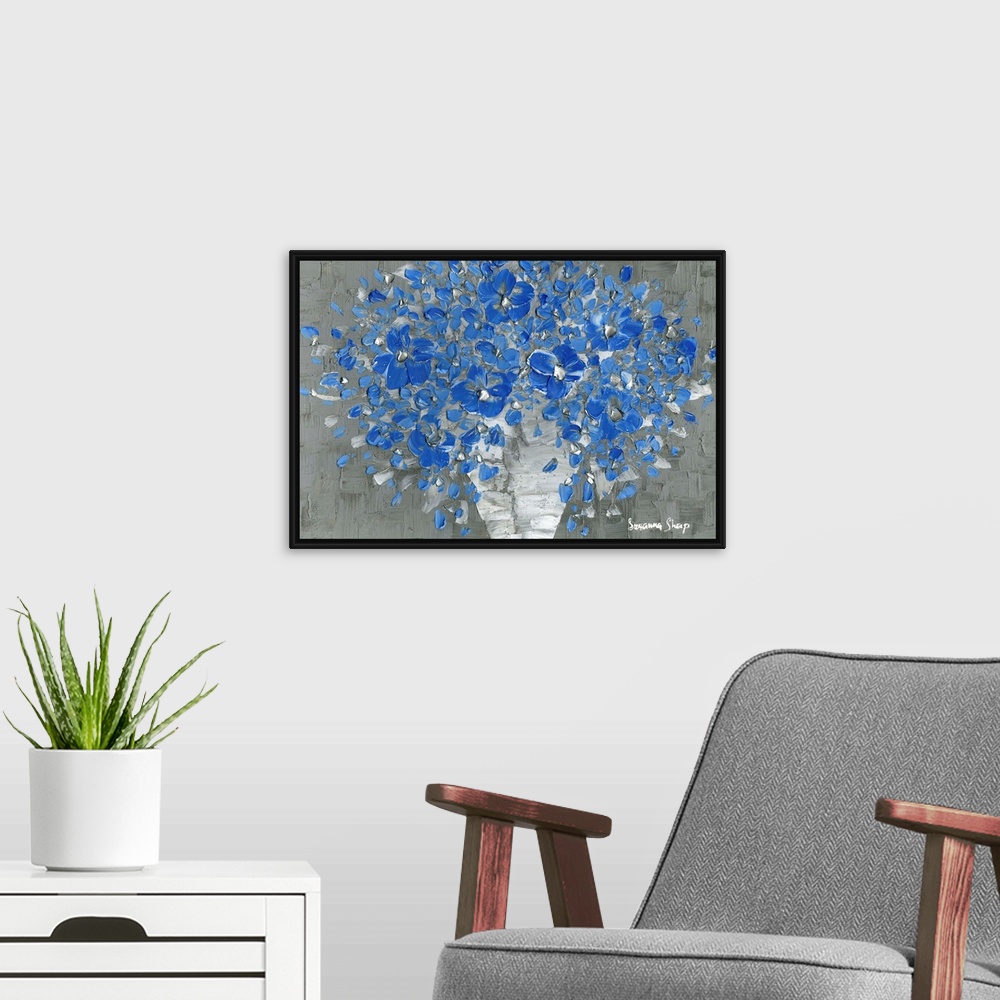A modern room featuring Contemporary painting of a bouquet of blue flowers with silver highlights in a white vase with a ...