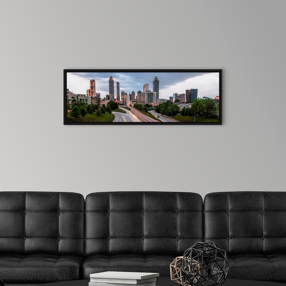 A modern room featuring Panoramic photo of skyscrapers in the Atlanta, Georgia skyline in the late afternoon.