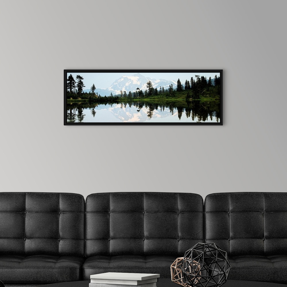 A modern room featuring Panoramic photograph of Mt. Shuksan reflecting into Picture Lake around sunset.