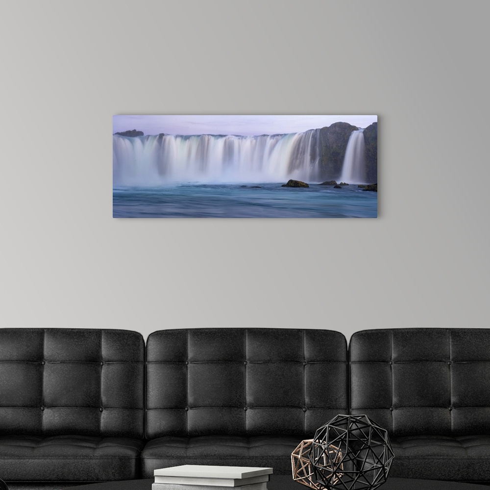 A modern room featuring Iceland, Godafoss Waterfall. The waterfall stretches over 30 meters with multiple small waterfall...