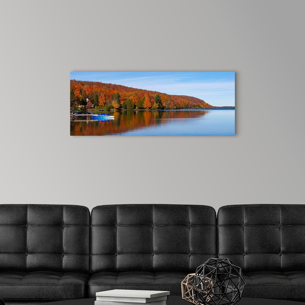 A modern room featuring Autumn trees at lakeshore, Lake Bowker, Quebec, Canada