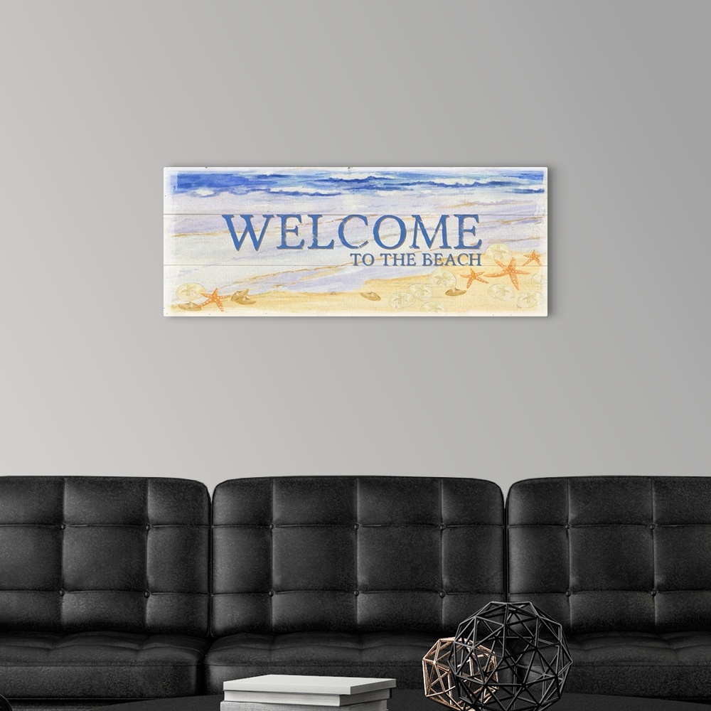 A modern room featuring A watercolor beach painting on a wood panel design with the words 'Welcome To The Beach'.
