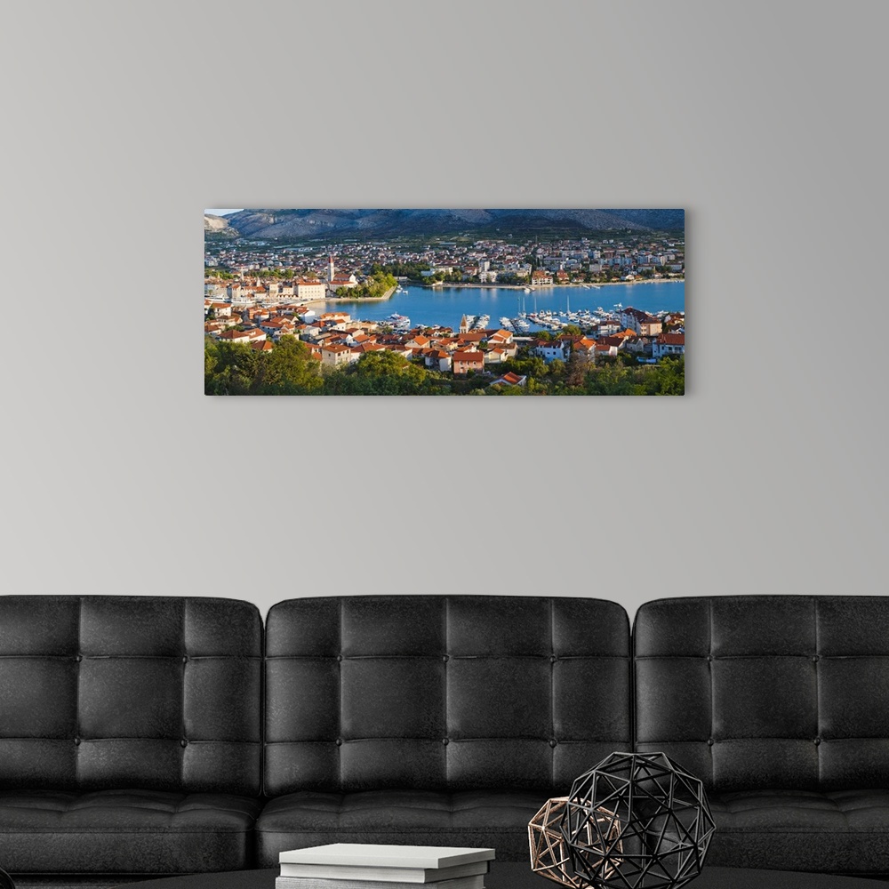 A modern room featuring The Cathedral of St. Lawrence and the harbour at sunrise, Trogir, Croatia