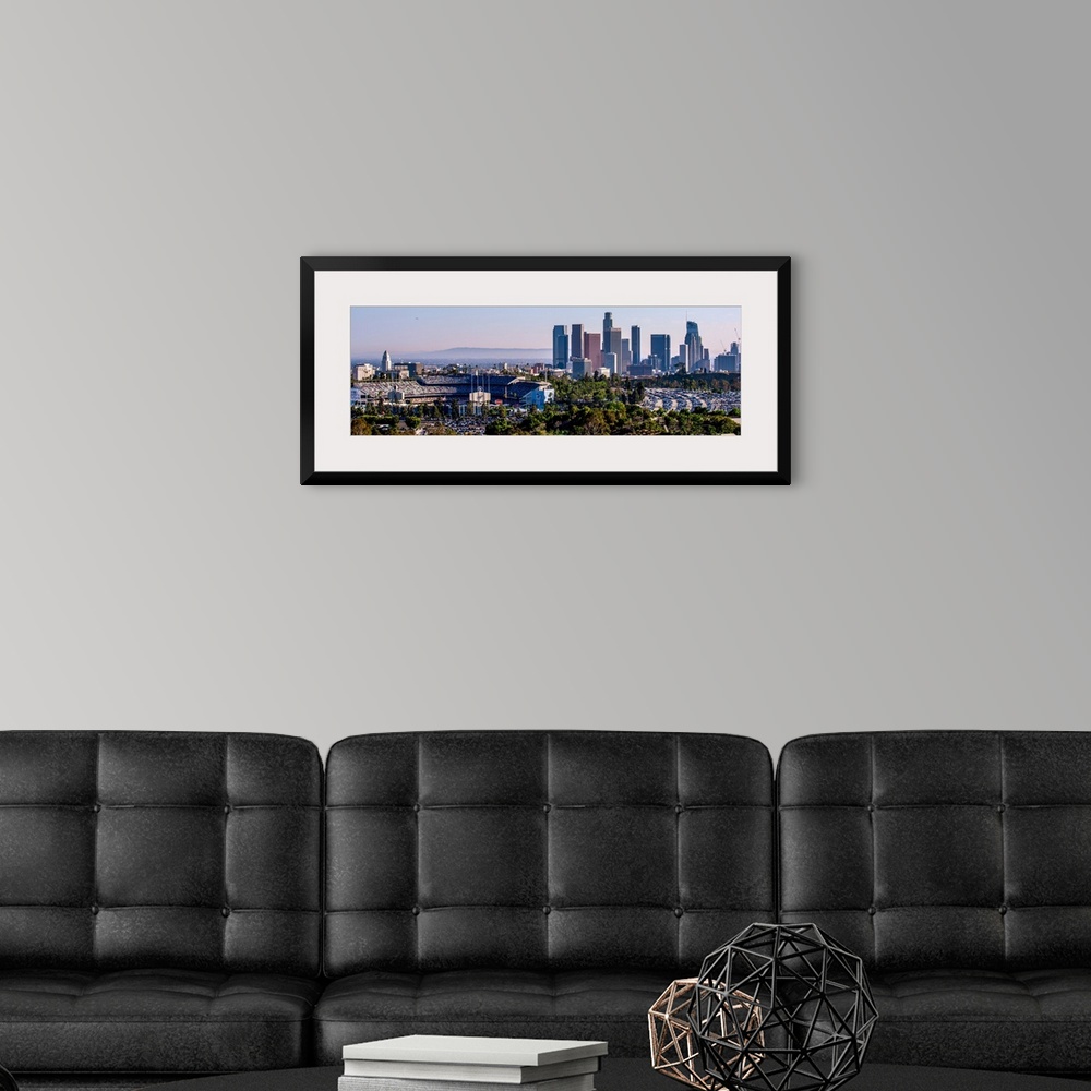 A modern room featuring Panoramic photograph of the downtown Los Angeles skyline with Dodger Stadium on the left.