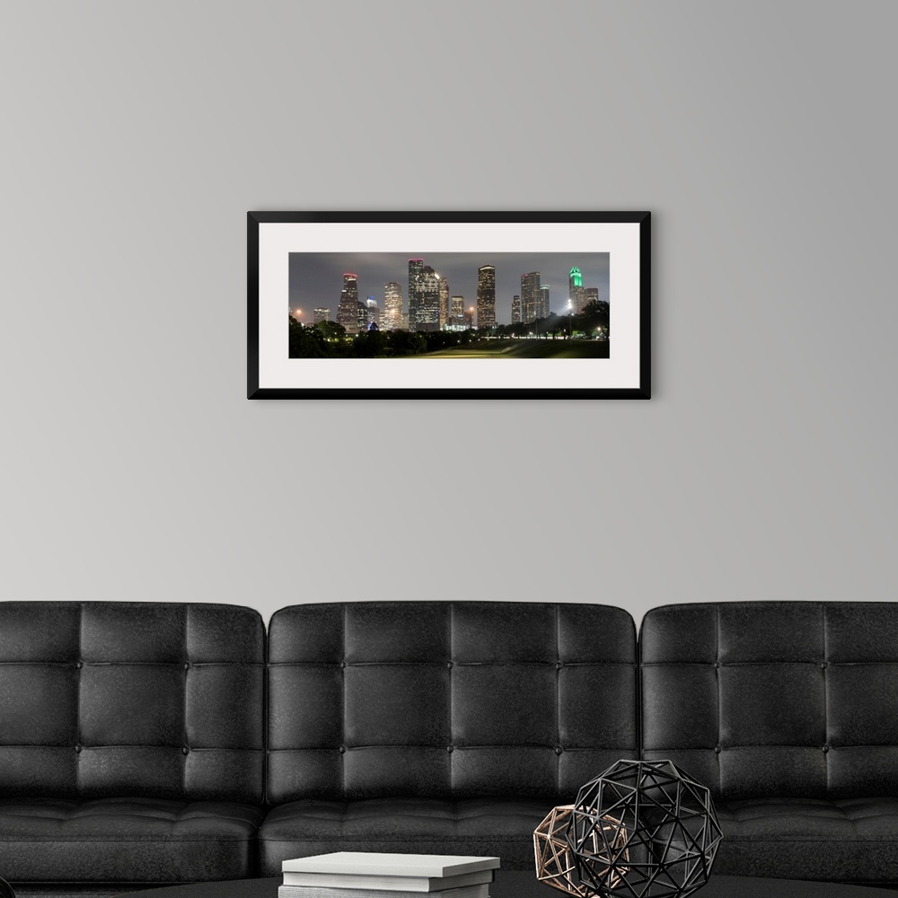 A modern room featuring Panoramic photograph of the Houston TX skyline at night from Eleanor Tinsley Park.