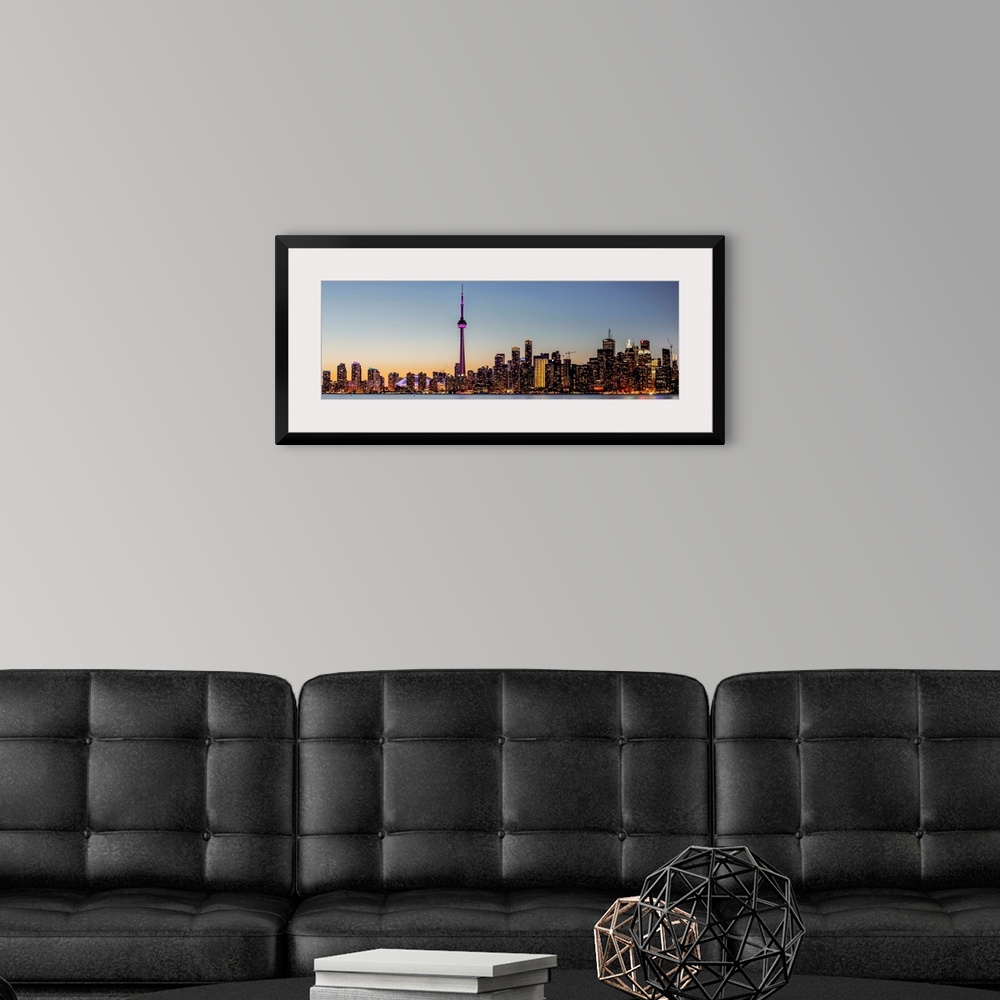 A modern room featuring Photo of Toronto city skyline at night, Ontario, Canada.