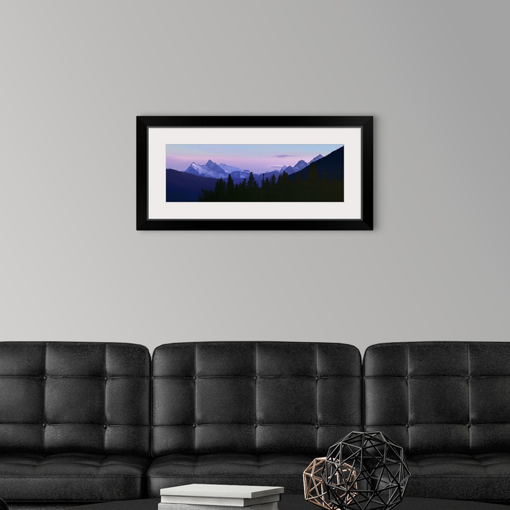 A modern room featuring Canada, British Columbia, Mt Terry Fox. Mount Terry Fox turns periwinkle in the settling dusk, Br...