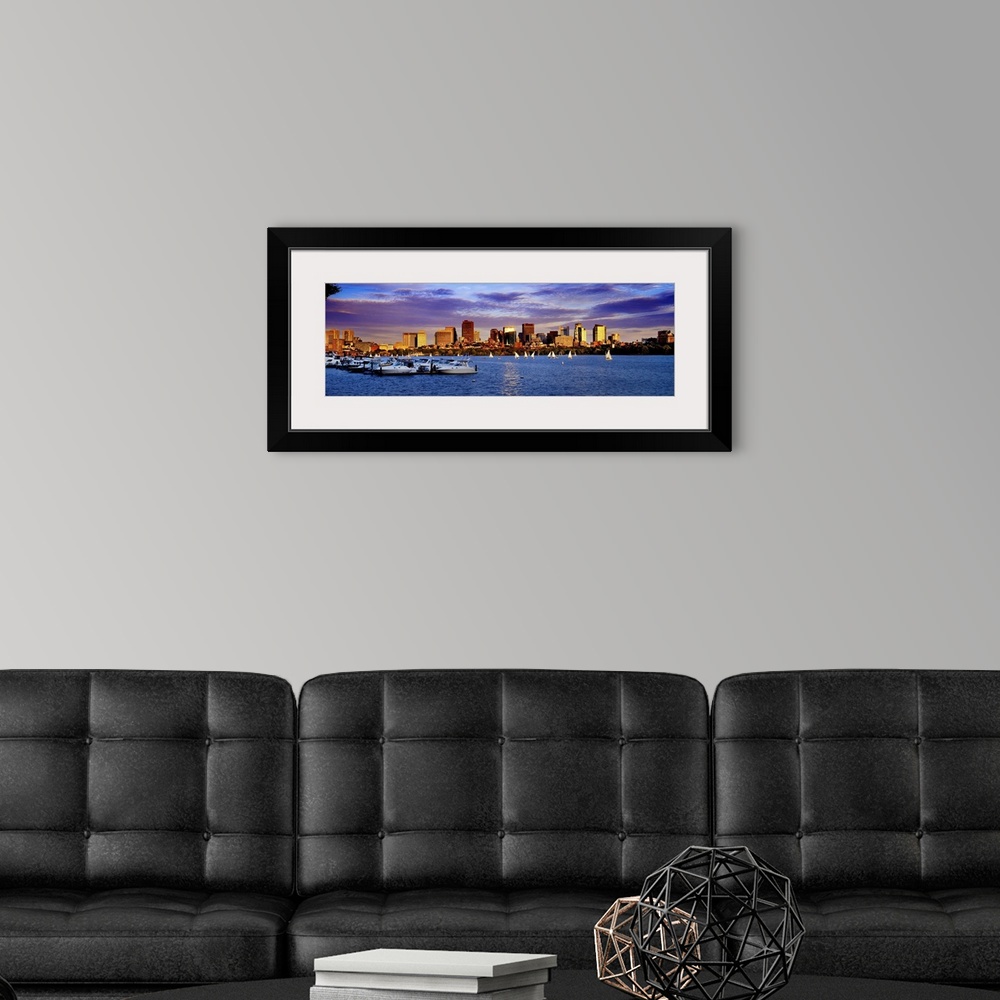 A modern room featuring Massachusetts, Boston, View of the skyline and the Charles River at sunset