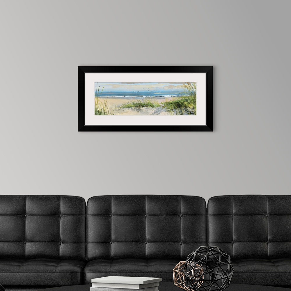 A modern room featuring Contemporary landscape painting of grass on a sandy beach at the edge of the ocean.