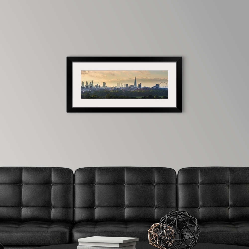 A modern room featuring London skyline with the Shard above Hyde Park, London, England, UK
