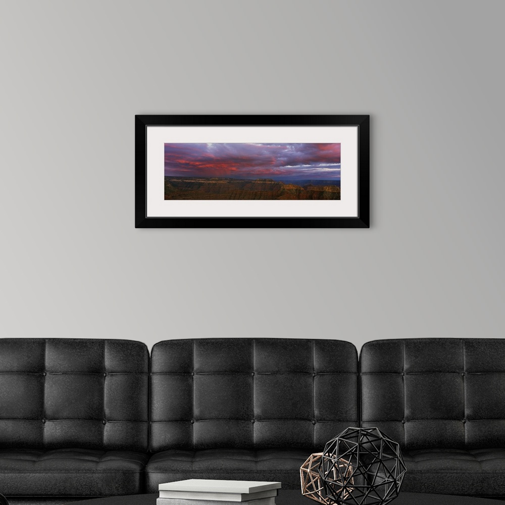 A modern room featuring Panoramic photo taken on the rim of the Grand Canyon looking out towards the other side as clouds...