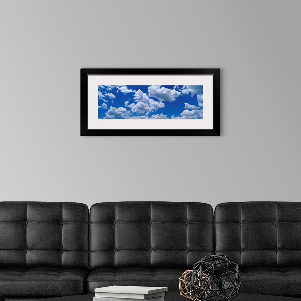 A modern room featuring Fluffy Clouds in Fair Weather Sky