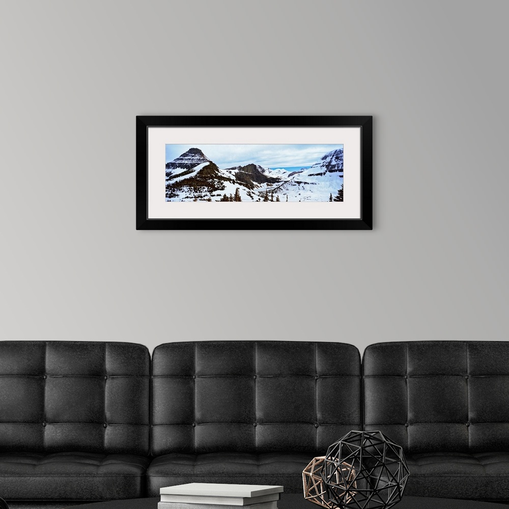 A modern room featuring Lake flowing through mountains in winter, Hidden Lake, US Glacier National Park, Montana