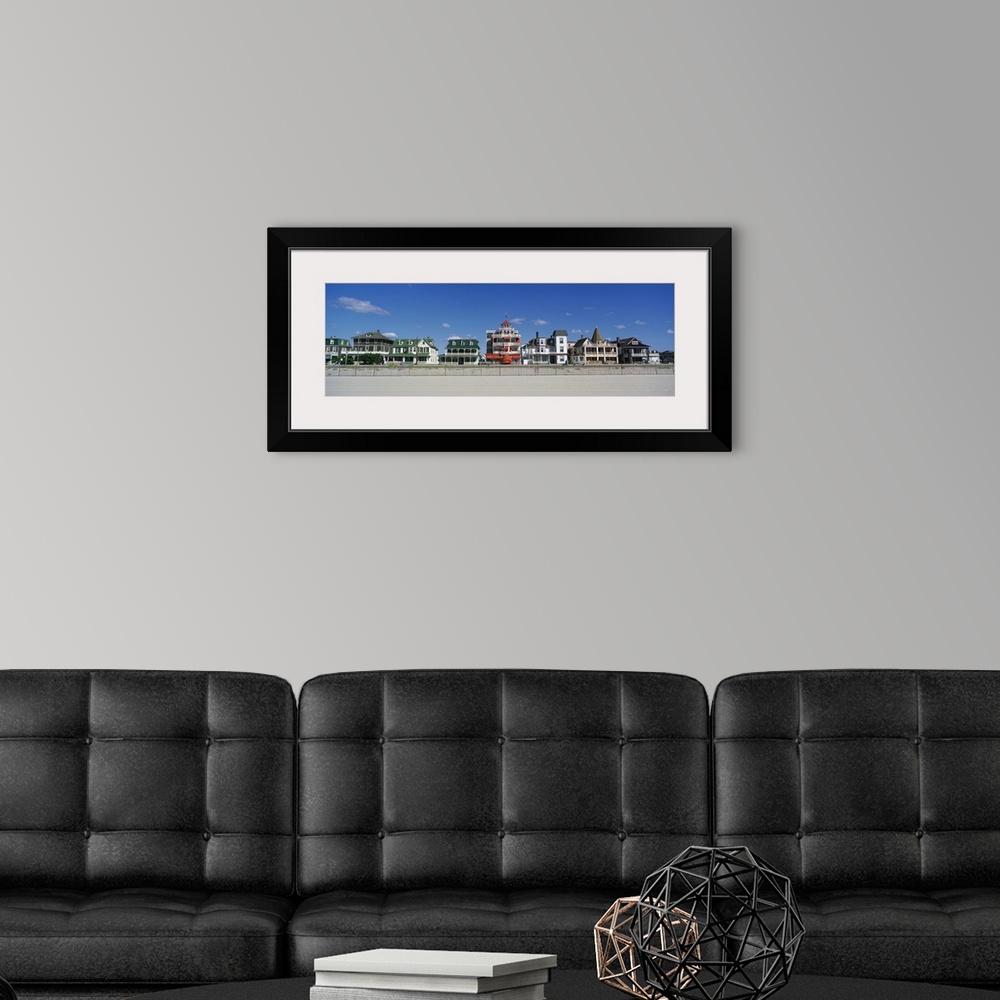 A modern room featuring Bright, beach homes on a cloudy day on Main Street Cape in May, New Jersey.