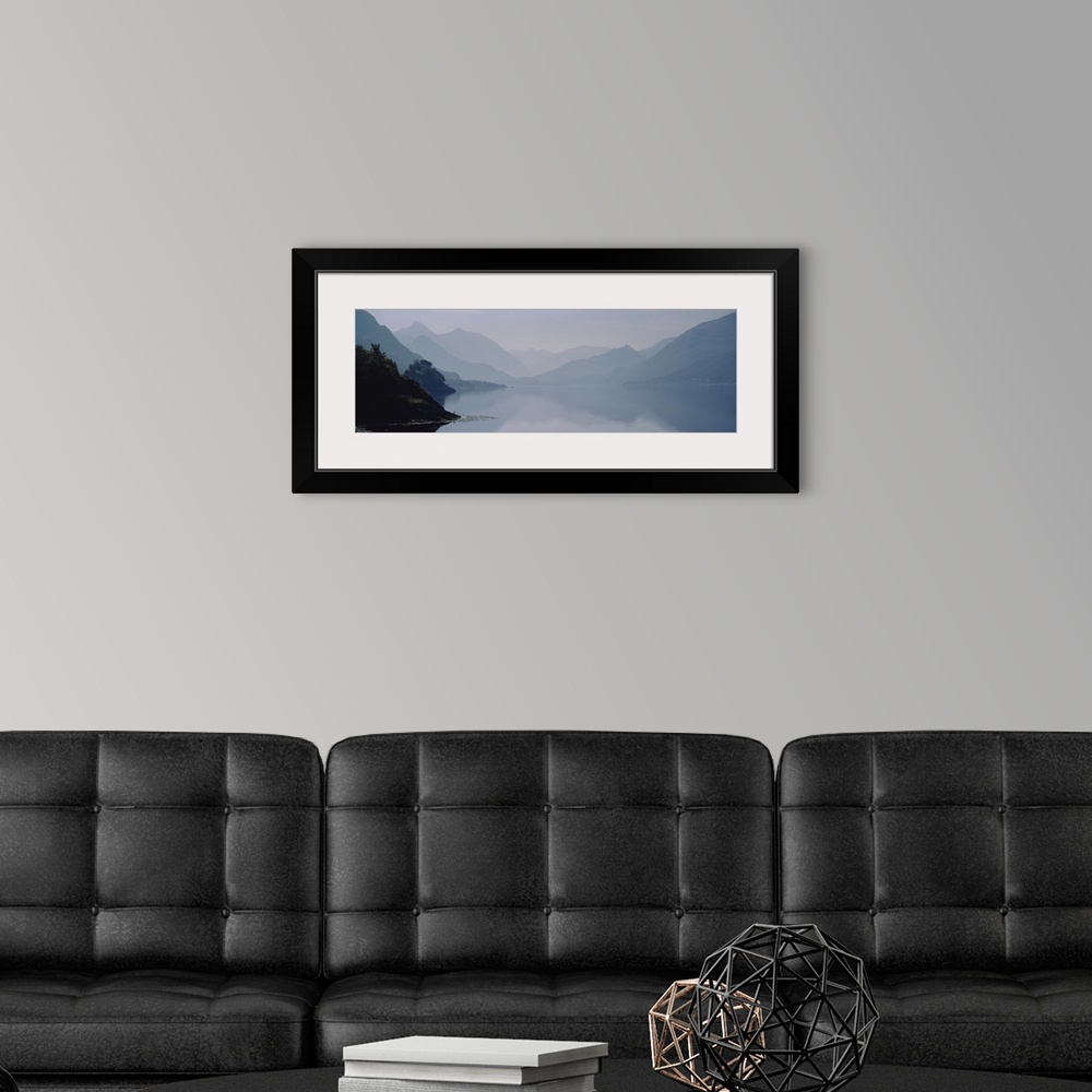 A modern room featuring Mountains covered with fog, Scotland