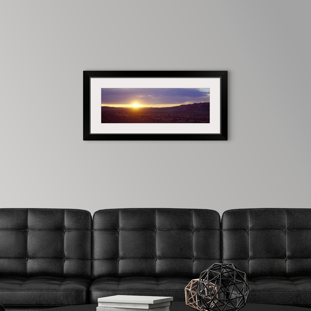 A modern room featuring Sunset Monument Valley AZ