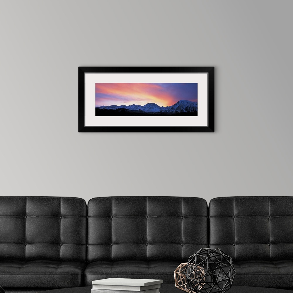 A modern room featuring Sunset over Sierra Mountains CA