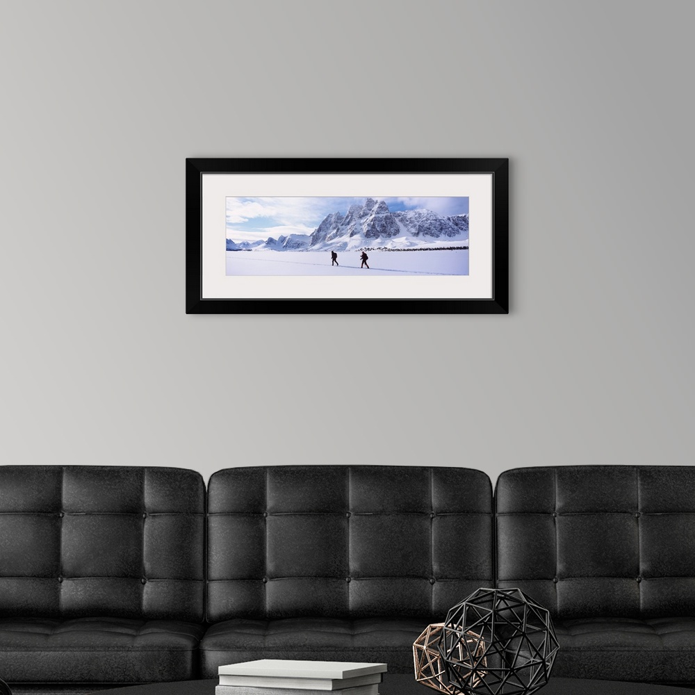 A modern room featuring Two people skiing, The Ramparts, Amethyst Lake, Tonquin Valley, Jasper National Park, Alberta, Ca...