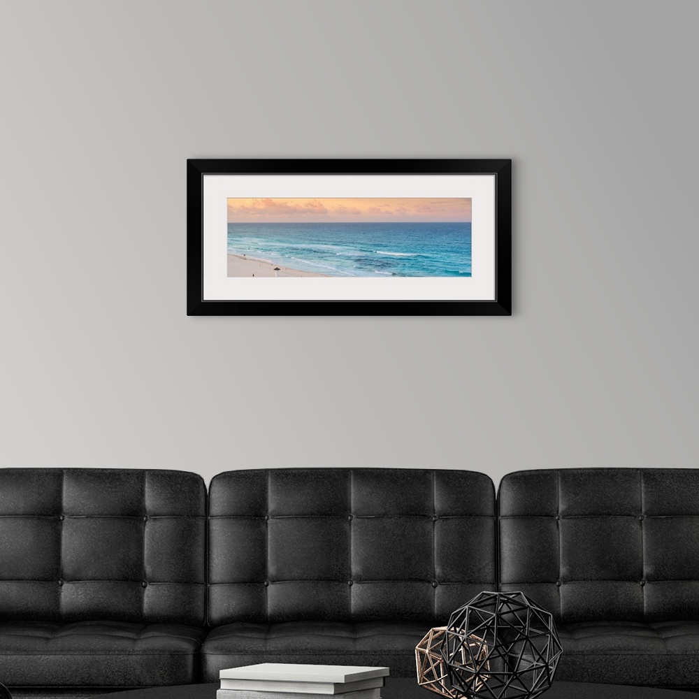 A modern room featuring Panoramic aerial photograph of the ocean in Cancun, Mexico at sunset. From the Viva Mexico Panora...