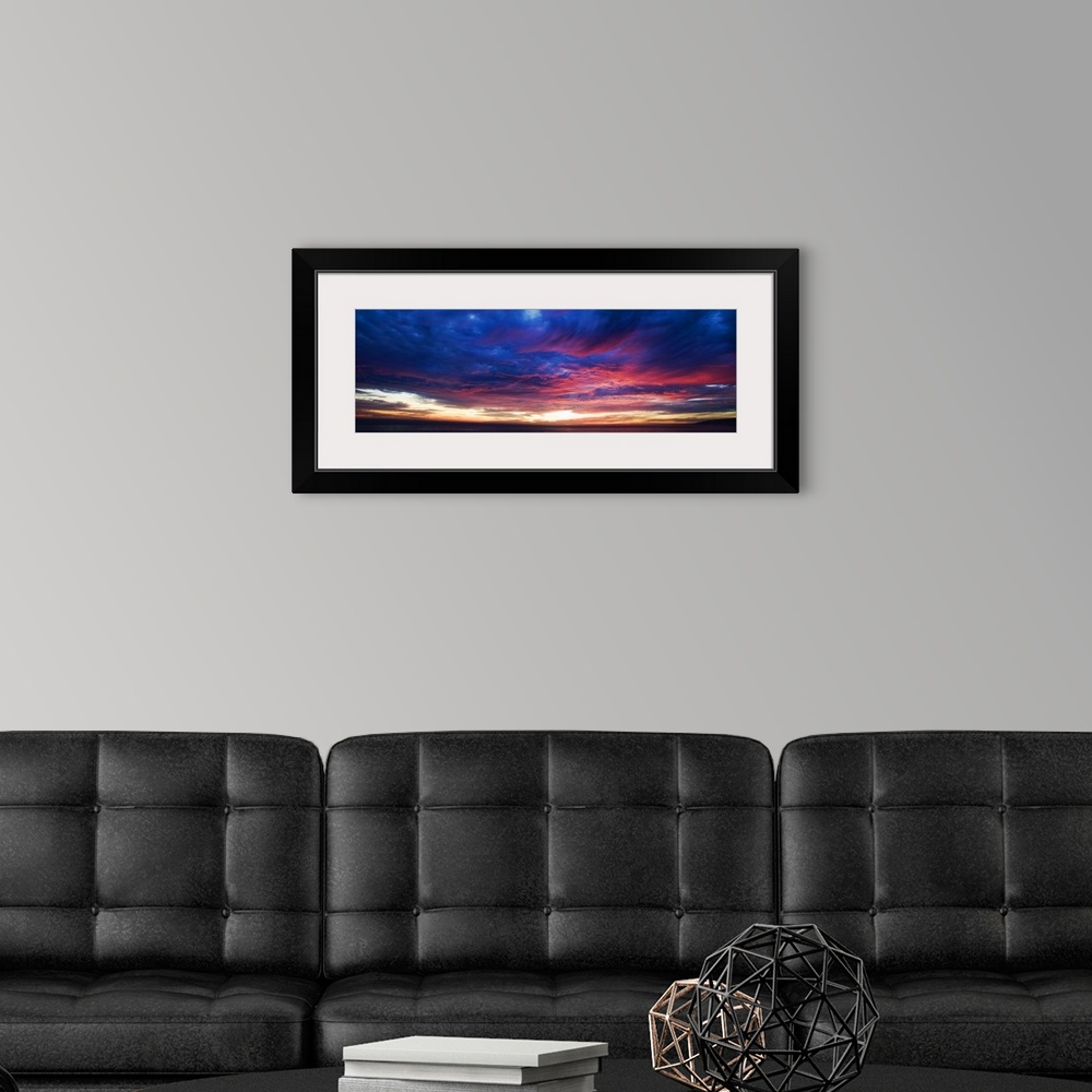 A modern room featuring Colorful sunset over Malibu, California