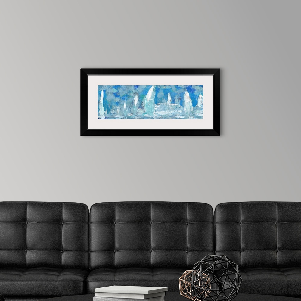 A modern room featuring Horizontal artwork of a group of white sailboats against a blue sky.