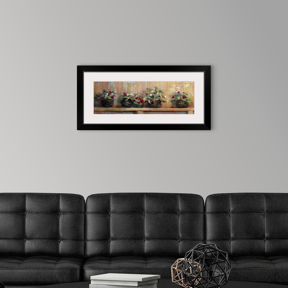 A modern room featuring Long canvas painting of strawberry plants in pots on a wooden shelf.