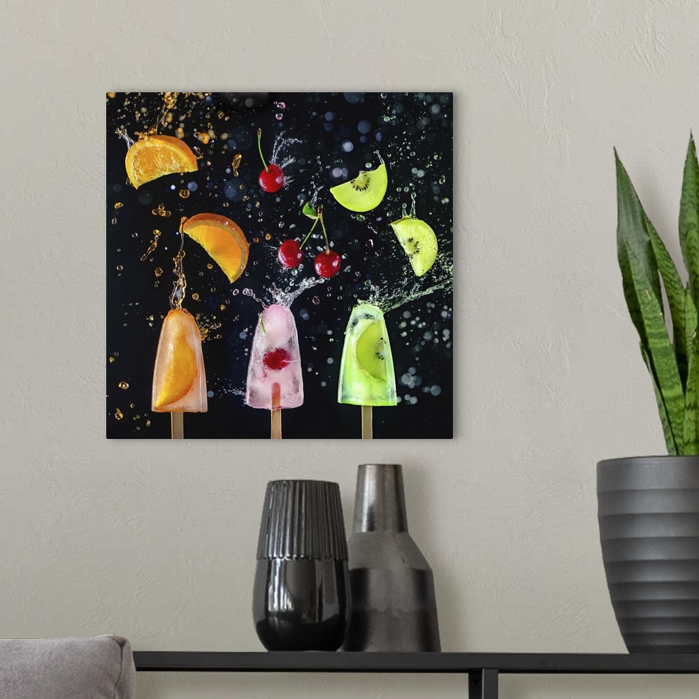 A modern room featuring Popsicles with fresh cherries, orange slices and kiwi fruit on a dark background, dynamic shot wi...