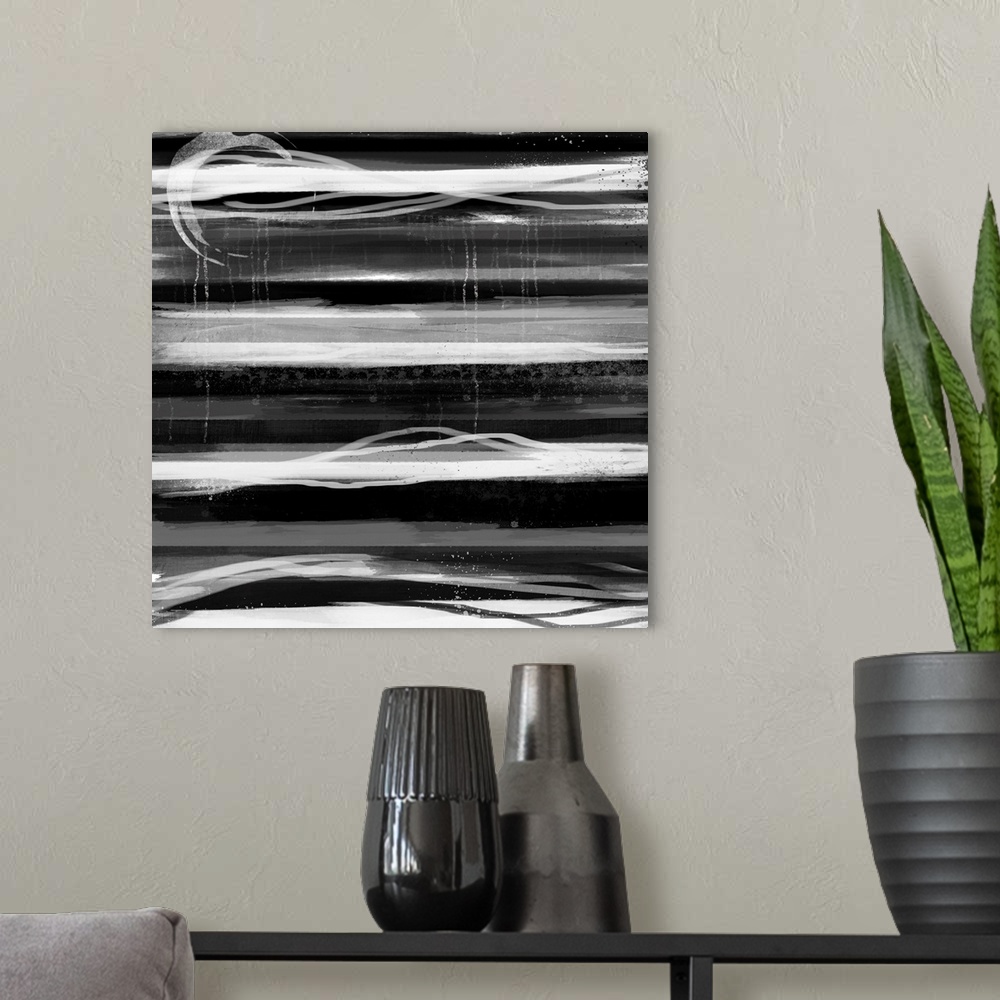 A modern room featuring Abstract contemporary painting of heavy dark streaks moving horizontally along the canvas.