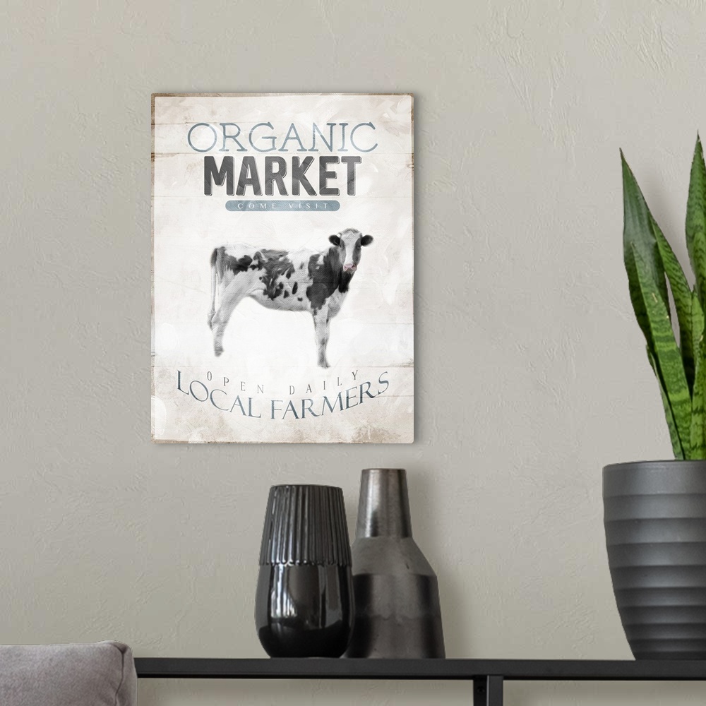 A modern room featuring "Organic Market, Come Visit, Open Daily, Local Farmers" with an image of a cow.