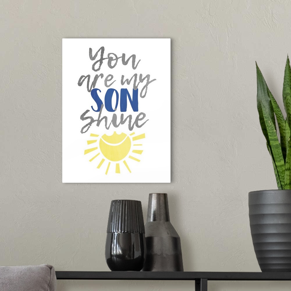 A modern room featuring Children's typography artwork with a sunshine design, for a boy's room.