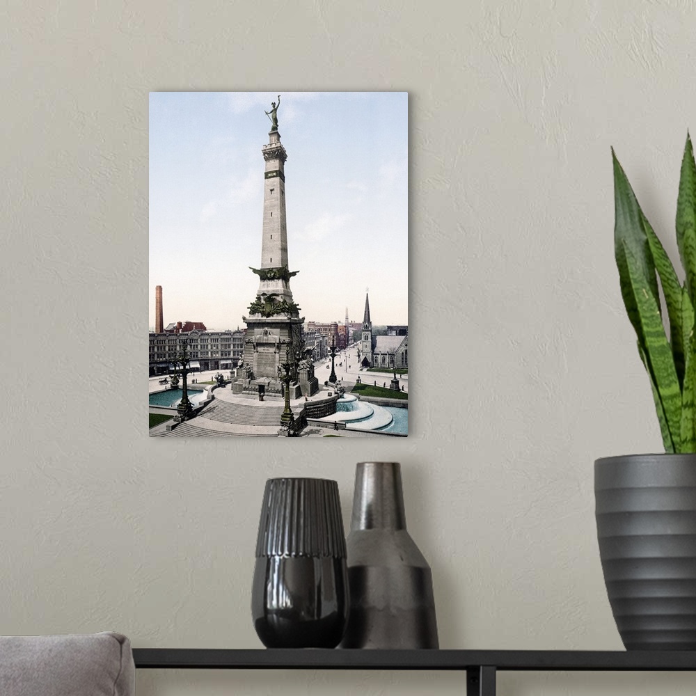 A modern room featuring Photograph of governmental monument surrounded by buildings.