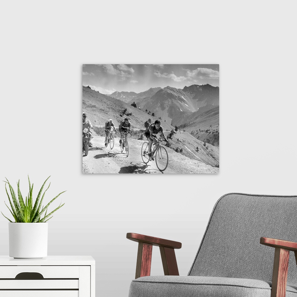 A modern room featuring 18th August 1951:  Cyclists competing in the Tour de France riding through the French Alps Origin...