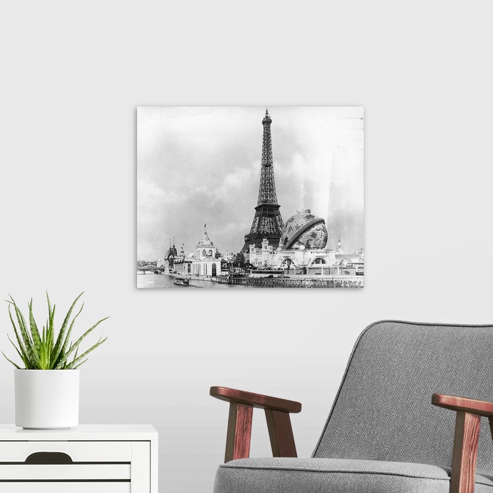 A modern room featuring View at the 'Exposition Universelle' across the River Seine towards the Eiffel Tower, and the 'Gl...
