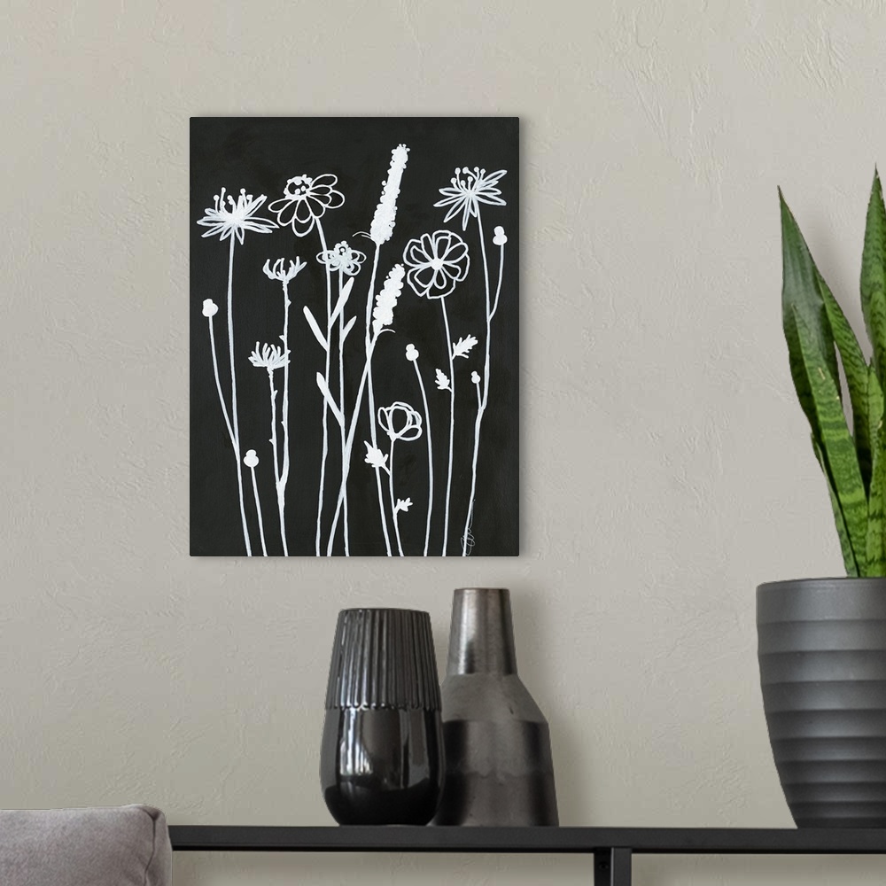 A modern room featuring Simple black and white illustration of long-stemmed flowers.