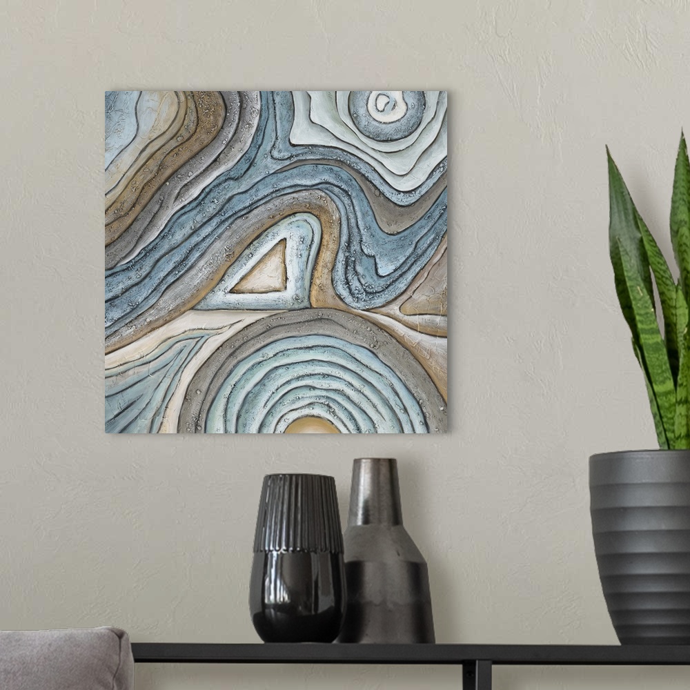 A modern room featuring Contemporary abstract artwork of a close-up view rock sediment.