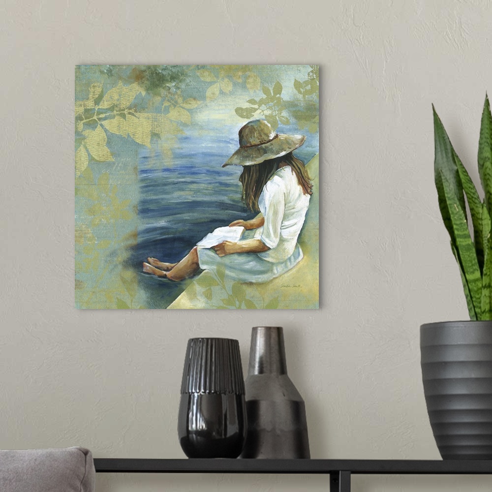 A modern room featuring Painting of a woman with a wide-brimmed hat reading a book with her feet in the water.