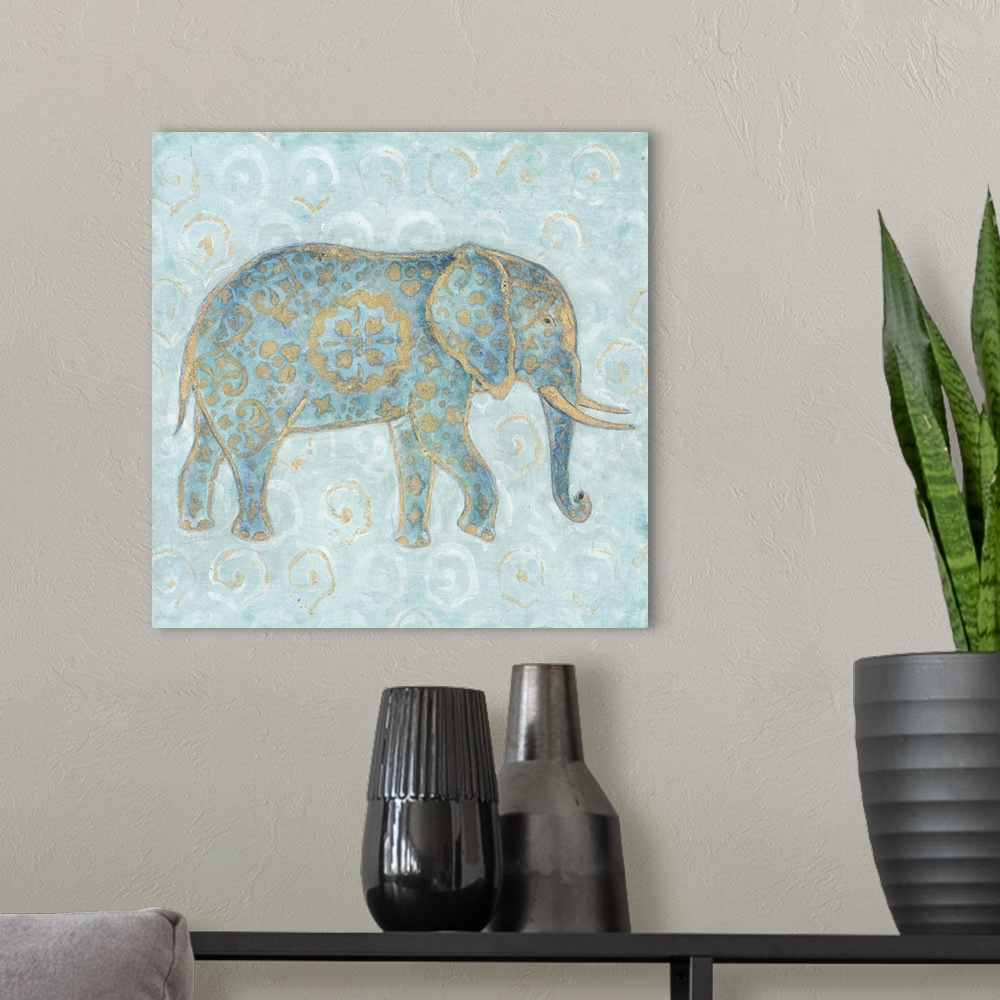 A modern room featuring Artwork of an Indian Elephant in blue with a golden design on a pale blue patterned background.