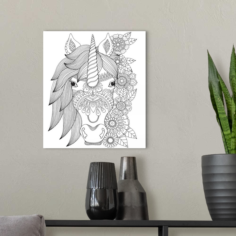 A modern room featuring Black and white line art of a unicorn head with a line of flowers flowing down the right side.