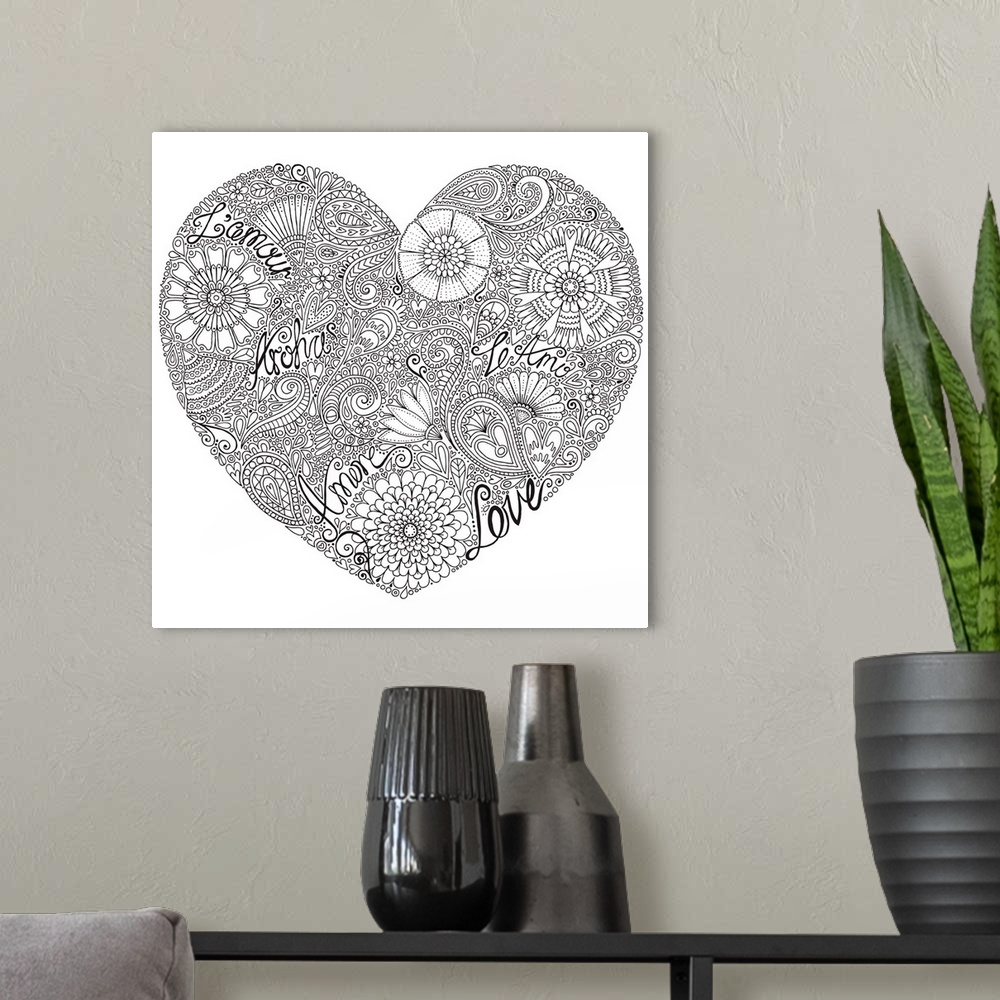 A modern room featuring Black and white line art made out of flowers creating a heart shape with the word "love" written ...