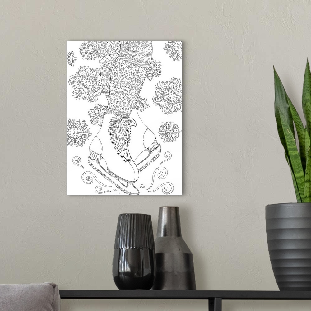 A modern room featuring Winter themed black and white lined art of a pair of ice skates and snowflakes.