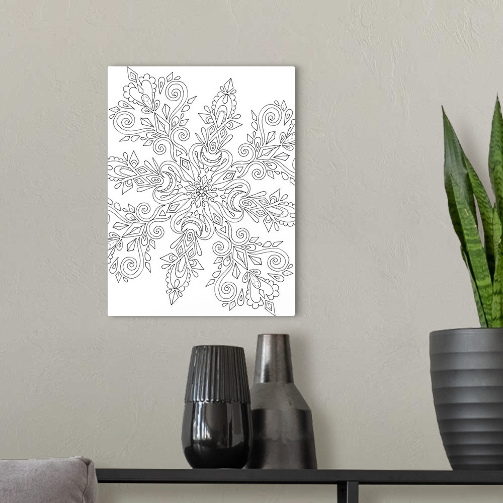 A modern room featuring Black and white line art in the shape of a giant snowflake with intricate designs.