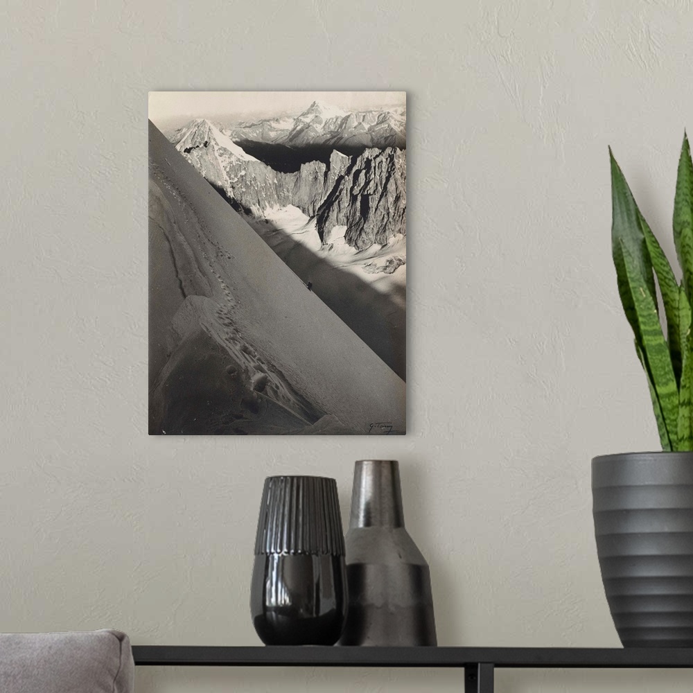 A modern room featuring A climber ascending the North East face of les Droites, Chamonix, France, silver gelatin print.  ...