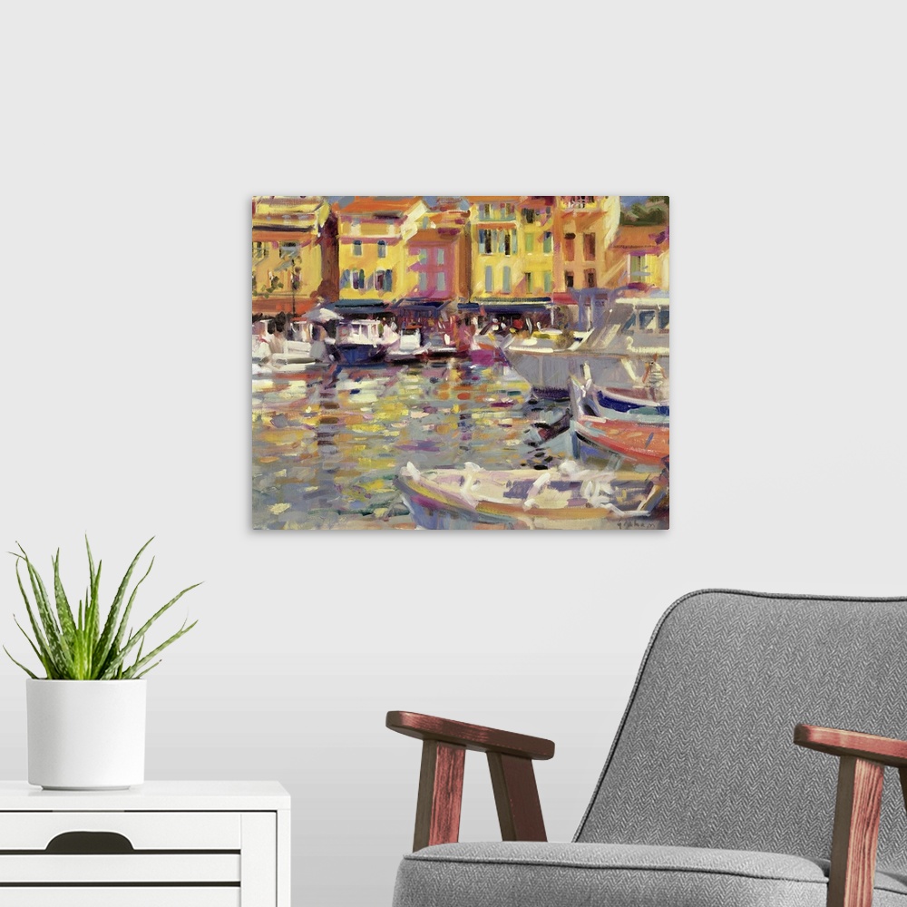 A modern room featuring Big, horizontal wall painting of a harbor full of boats in Cassis, France, a row of buildings in ...