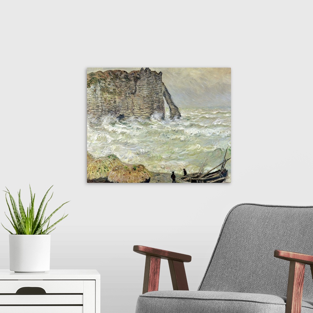 A modern room featuring A painting by Claude Monet of two men standing by beached boats as rough waves pound the beach an...