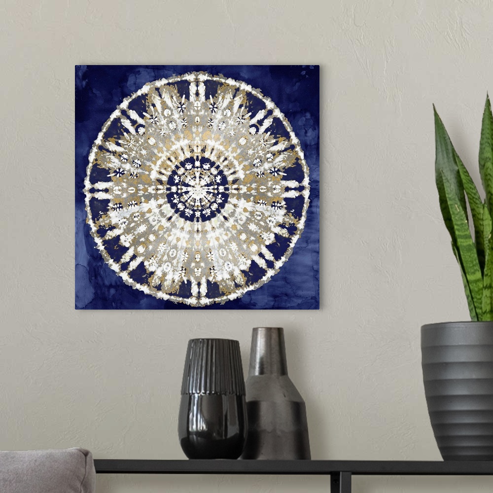 A modern room featuring Square abstract decor with a white, gold, and silver mandala on an indigo background.