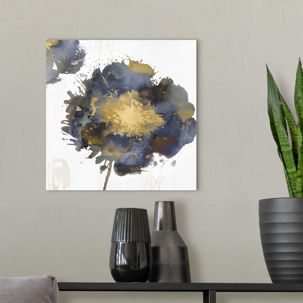 A modern room featuring Square decor with a single paint splattered flower in gold, silver, and blue hues.