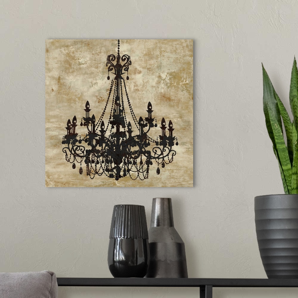 A modern room featuring Square decor with a black chandelier on a distressed gold background.