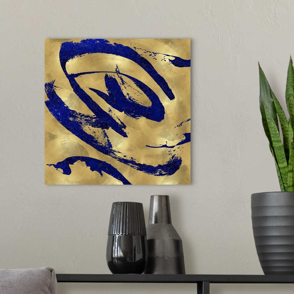 A modern room featuring Gestural and energetic brush strokes in blue decorate a mottled gold color background in this con...