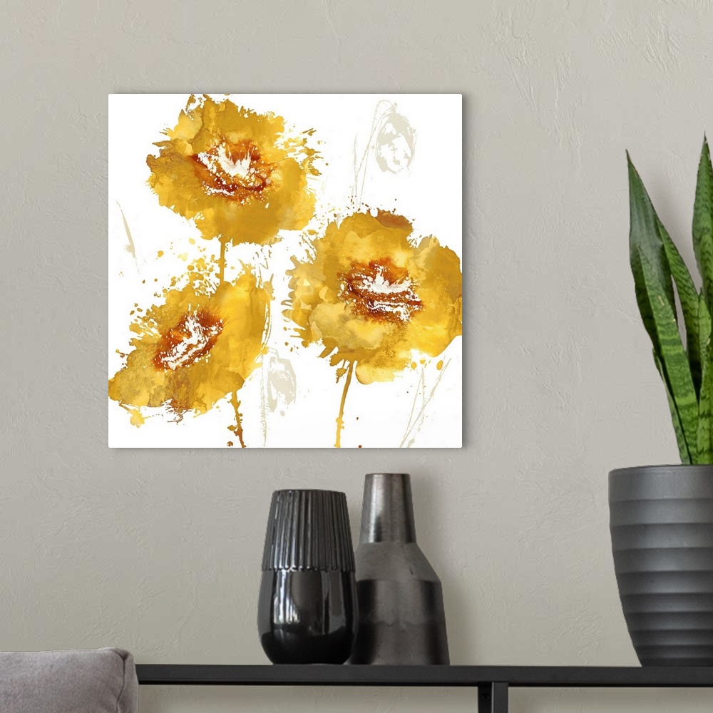 A modern room featuring Square decor with three warm paint splattered flowers in gold and orange hues.