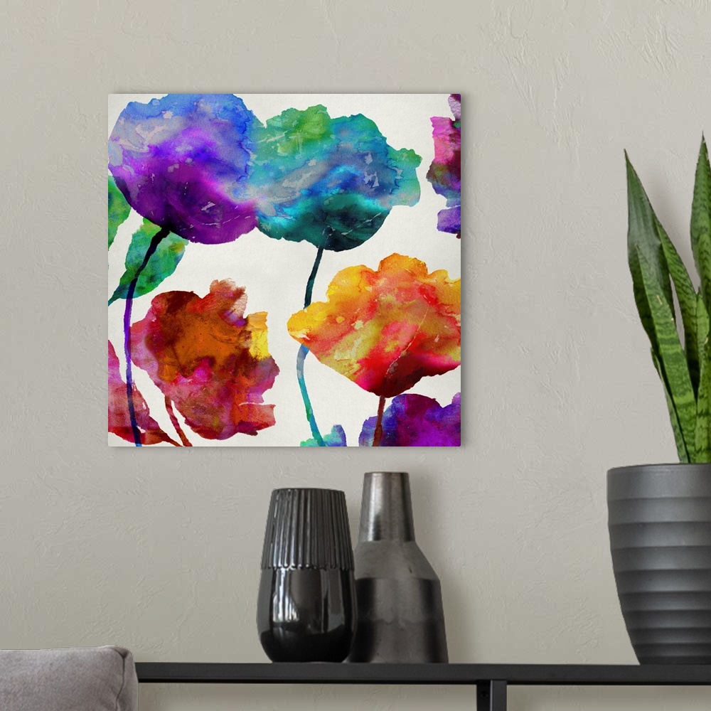 A modern room featuring Square art with silhouettes of flowers with multiple colors melding together with a watercolor lo...